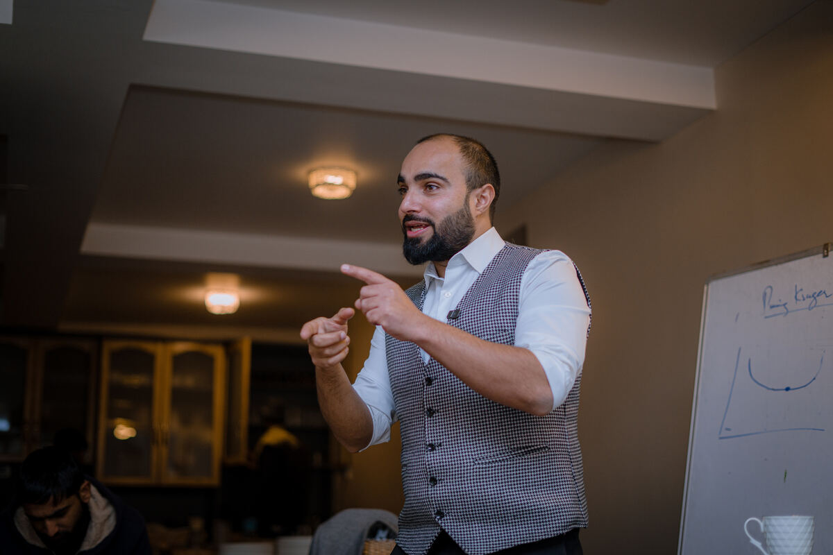 Farhat Umar facilitating a small-group session
